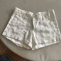 100% Linen Shorts. Size 0. White. Super Cute! And Comfy! Great Condition! Never Worn, New With Tags. I Got Them From A Boutique. They Aren’t High Wasted, But Aren’t Low Rise Either.