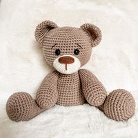 Crochet Teddy Bear Information This classic crochet teddy bear pattern is about 9 inches tall sitting and the perfect size for pretty much any age if you are looking to gift this sweet little teddy bear. I love his expressive little face and how perfectly cuddly he is! This is a great pattern for advanced...