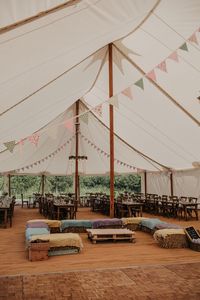 Pole Tent Bunting Hay Bale Seating Celeste Marquee Wedding Sarah Longworth Photography #PoleTent #Bunting #HayBale #WeddingSeating #CelesteMarquee #MarqueeWedding #Marquee #Marquee