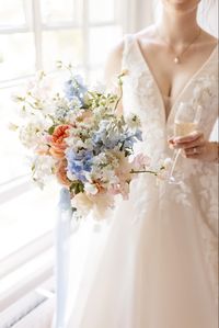 Pretty summer blue, pink and white summer wedding bouquet