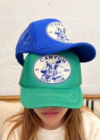 In an effort to reduce and repurpose, we designed our Canyon Surf patch with the intention to rescue our purple corduroy truckers from the fate of the landfills. After a misprint deemed these hats unusable for our client, we were able to create meaning from the mishap and our official Canyon Surf Club was born. Now also available in Green and Blue foam truckers as well as our newest Forest twill trucker. Adjustable sizing Unisex fit