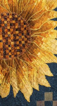 Sunflower Quilt, not a huge quilt making person myself but the people who have the time and skill to make things like this one: it's incredible!