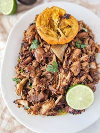 This Cuban mojo inspired carnitas is full of refreshing flavors and go amazing with the next family taco night.