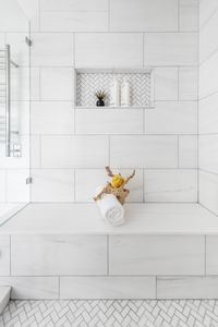 Sophisticated and fresh-looking Bianco Dolomiti marble, used in mixed formats, makes this master a clean and classic space to renew in. Design by Ayelet Rosen and Michal Abehsera.