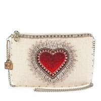 Radiate love and elegance with this bold mini crossbody purse. The creamy backdrop makes the dazzling heart the center of attention, perfect for adding a touch of romance to any outfit. Whether it's for a special night out or everyday flair, this bag is sure to make your style shine.