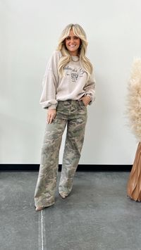 Camo pants for the win 🙌🏻   Spice up your wardrobe with these graphic pants!   #camo #jeans #womensoutfits #sweatshirt