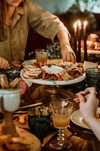 Are you in charge of hosting Friendsgiving this year? Learn how to host a sure-fire feast your friends will never forget!