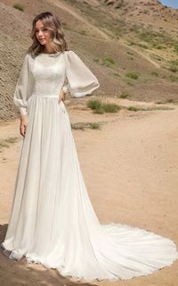 Details: Silhouette: A-Line Style Fabric: Chiffon Fabric Color: White Color Length: Sweep Train Neckline: Bateau Neck Sleeves: Long Sleeves Back: Covered Button Back Embellishment: Appliqued