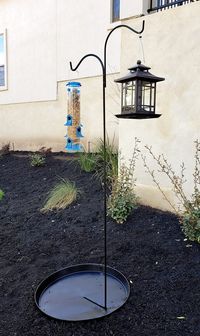 DIY Bird Seed Catcher. Make this bird seed catcher to keep the area under the bid feeder weed and mess free!