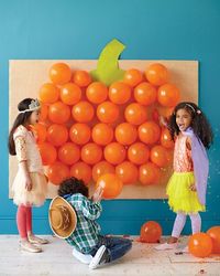 Put treats in the balloons and then have the kids pop em! Better than a pinata