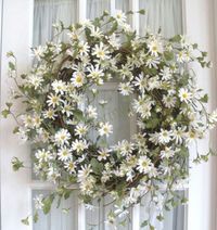 Daisy Wreath for Front Door-adorable. Add some small craft butterflies for a whimsical spring touch.