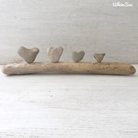 A unique sculpture of 4 naturally formed heart stones mounted on an authentic California driftwood. What a great way to honor your family unit or a perfect gift for a friend.We find our beach treasure on remote Santa Barbara coastline.We love to do custom work, so please feel free to send a request via convo.