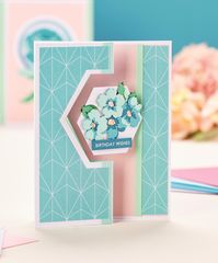 Find out how to make a Floral Spinner Card with this free paper crafting