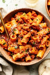 A rich & hearty Sausage Ragu sauce made by slowly simmering sweet and spicy Italian sausage with veggies, herbs, tomatoes & wine.