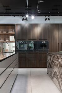 Linear kitchen, concealed kitchen and two islands