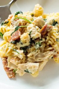 Caramelized Onion Bacon Pasta Bake is made with chopped chicken and bites of bacon, with sweet caramelized onions, in a creamy Gruyere sauce.