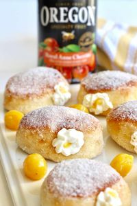 Baked donuts that are sugary crisp on the outside, fluffy on the inside, and filled with the most fabulous Royal Anne cherries and cream filling! #bakeddonuts #creamfilleddonuts