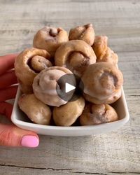 2 ingredient dough Cinnamon Roll Bites 😍 | 2 ingredient dough - Cinnamon Roll Bites 😍

Try these fresh and warm for the best texture. These little bites are super quick and easy to make and they... | By Fitwaffle | We're going to be making
cinnamon roll bites with two ingredient dough. Mix together
Greek yoghurt and self-raising flour until just combined. Make
sure you don't over mix. Then flour your surface and roll in
pin and roll the dough out to about half a centimeter thick.
Mix melted butter, light brown sugar, and cinnamon to form a
paste and spread it over your dough all the way to the edges.
Cut it into small pieces and roll into balls. Make sure the
edges are sealed otherwise they might unravel in the oven. Bake
in the oven and make the glaze. Mix together icing sugar and
milk 