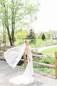 The beautiful bride on the vineyard path at Bear Brook Valley | Photographer: Keri Calabrese | Florist: Conroy's Florist