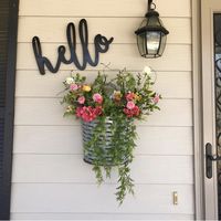 Hello sign next to front door