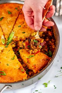 Homemade Cornbread Tamale Pie - A Mexican cuisine inspired classic skillet dinner with a flavorful seasoned ground beef filling topped with cheesy cornbread made from scratch! #aberdeenskitchen #homemade #cornbread #tamale #pie #Mexicanfood #Mexicancuisine #comfortfood #skilletdinner