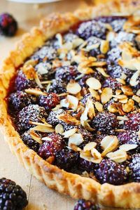 Jump to Recipe Print RecipeBlackberry tart topped with toasted almonds – this French style dessert is made completely from scratch, in a homemade tart crust! This blackberry tart is all about the Summer, and a great way to use up all those blackberries you might have bought on a whim! The homemade tart shell is...Read More