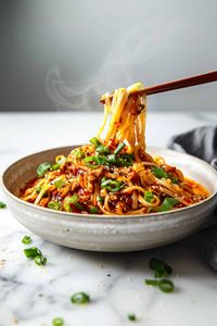 Quick and easy Szechuan noodles recipe! Ready in 30 minutes, these spicy Chinese noodles make the perfect easy dinner with garlic chili oil.