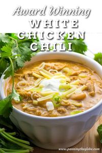 This White Chicken Chili is everything you want white chicken chili to be - Creamy and flavorful, filled with tender chicken and hearty white beans and a perfect amount of spice and heat - it's the absolute best! #ChickenChili #WhiteBeanChili #AwardWinningChili #BestChili