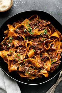 Slowly braised beef short ribs create a hearty and boldly flavored ragu sauce in this Short Rib Ragu recipe. Ultimate Italian comfort food!