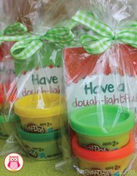 Combine mini holiday play dough mats with a small container of play dough to create a great stocking stuffer, gift for students, or holiday party favor. Free printable Christmas play dough mats and gift card.