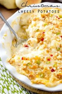 Diced green peppers and pimentos give these Christmas cheesy potatoes a festive look. They're a perfect, comforting side to a holiday meal. via @tastesoflizzyt