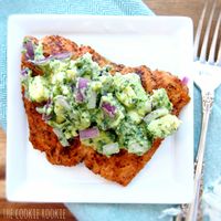 Grilled Salmon with Avocado Salsa is our favorite Healthy Whole30 Salmon Recipe! This spice-rubbed grilled salmon recipe is served with creamy avocado salsa. It's healthy, flavorful, easy, and so delicious. It's a flavor match made in Heaven. Recipe via TheCookieRookie.com