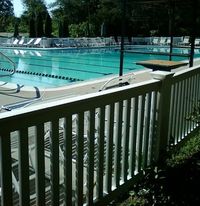 4′ Explorer PVC pool picket fencing fabricated and installed by Liberty Fence & Railing. Double virgin vinyl.