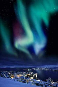 Aurora borealis in Murmansk. It's a port city, located in the extreme northwest part of Russia, on the Kola Bay, an inlet of the Barents Sea on the northern shore of the Kola Peninsula, not far from Russia's borders with Norway and Finland.