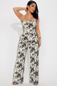 Available In Cream/combo. Mesh Jumpsuit Adjustable Spaghetti Straps Cowl Neck Backless Wide Leg Lined Stretch Disclaimer: Pattern Placement May Vary Self: 95% Polyester 5% Spandex Lining: 100% Polyester Imported | Fall In Love Jumpsuit in Cream size Small by Fashion Nova