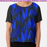 Shop for Neo Tropical - Night Garden Chiffon Top by © SilverPegasus / Add some dreamy botanical flair to your outfit with this chiffon top with short sleeves, featuring a beautiful patterned leaves design in glowing hues of cobalt blue, midnight blue and deep blue, creating a contrast that is eye-catching and elegant. The chiffon fabric is light and airy, perfect for warm weather or layering. This top has a loose fit and a scoop neckline, giving it a flattering and comfortable shape. The design is printed on the front with a choice of black or white contrasting sleeves and back panel. Whether you pair it with jeans, a skirt, or shorts, this top will make your outfit look amazing. This top is also a great gift idea for anyone who loves botanical prints, or tropical vibes. Order yours today!