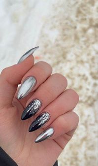 #BlackAndSilverNails #ChicNailDesigns #GlamNailArt #ElegantNails #BoldNailStyles #BlackNails #SilverNails #SparklingNails #NightOutNails #ClassyNailDesigns