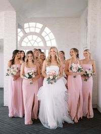 This group of bridesmaids looked cohesive but different dress cuts allowed them to make a unique statement as well.   See more of this LoveShackFancy Inspired Downtown Wedding on Wed Society® | San Antonio.