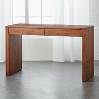 Shop Runway Acacia Wood Desk. Rich acacia wood desk stylishly downsizes for space in the office, entryway or bedroom. Discreet sleek dual drawers organize desk supplies and papers, keys and mail (perfect entry console), even cosmetics (makes a great vanity, too). CB2 exclusive.