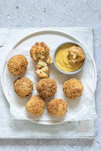 Make deliciously crunchy and gooey fried mac and cheese balls in your Air Fryer or Instant Pot! All that’s needed is just 3 ingredients to make this healthier version of the ultimate game day snack! Air fried mac and cheese balls are a great way to transform those holiday leftovers. Click through to get this awesome recipe!! #airfryer #airfryerrecipes #instantpot #leftovers #holidayleftovers #airfryerfriedmacandcheeseballs #macandcheese #macancheeseballs #appetizers #gamedayfood #comfortfood