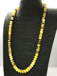 Baltic Amber necklace With clasp Material: 100% Genuine Natural Baltic Amber Amber with natural imperfections Comes from Baltic sea region Length : 68 cm (26,77 inch) Weight: 33 gr. (1,16 oz) Polished amber beads Beads size approx: 9,5-7,5 mm (0,37-0,29 inch) Handmade in Lithuania