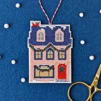 PRODUCT DESCRIPTION  Our Holiday Homes series includes a festive neighborhood of Chalets, Townhomes and a cozy Cottage, all adorned with greenery and sparkly beads! This colorful kit includes all the supplies you need, plus stitching and beading instructions, to make one Cottage.  You'll receive:    * 3x4” white perforated paper   * Embroidery floss   * Seed beads   * #24 embroidery needle   * #10 beading needle   * 3x4” felt for backing  Finished size is approximately 2.3” x 3.3”   Designed by (not so) Modern Millie for Benzie Design.