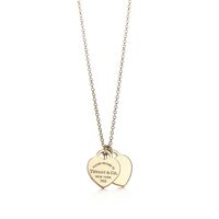 Inspired by the iconic key ring first introduced in 1969, the Return to Tiffany collection is a classic reinvented. A delicate duo of engraved tags on a simple link chain exudes sophistication and elegance. 18k gold; On a 16" chain | Return To Tiffany® Double Heart Tag Pendant in Yellow Gold, Mini, Size: 16 in.