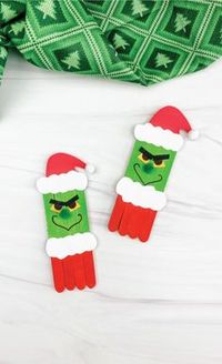 This Christmas season create your own Mr. Grinch with this popsicle stick Grinch craft for kids! Download the free printable template and let the kids make this simple project! It's great for older elementary aged kids.