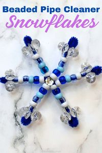 Wow! Aren't these pipe cleaner beaded snowflakes just the cutest? And they are so easy to make with just 2 pipe cleaners, a few pony beads, snowflake beads and sticker rhinestones. This cheap dollar store Christmas craft is perfect for kids of all ages too. Make a bunch of these for teacher gifts, DIY ornaments, and even place settings at your Christmas dinner table.