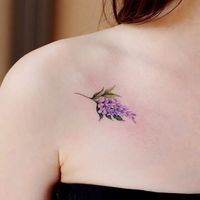 https://allabouttattoo.com/wp-content/uploads/2022/06/Minimalist-wisteria-tattoo.webp