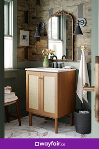 Bathroom inspiration, right this way. Bring in a wooden vanity, marble floor tile, and antique-inspired mirror to make this look yours.