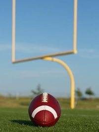 size: 24x18in Photographic Print: American Football on the Field with the Uprights Beyond by 33ft :