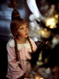 Cindy Lou Who is an iconic Christmas character that represents everything good. Check out these tips on how to do Cindy Lou Who hair and makeup this year for your Christmas parties and events! #Christmas #CindyLouWho #ChristmasHairstyles #ChristmasHair