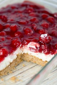 Cherry Delight - a yummy graham cracker crust with a middle layer of homemade whipped filling, all topped with a delicious layer of cherries!